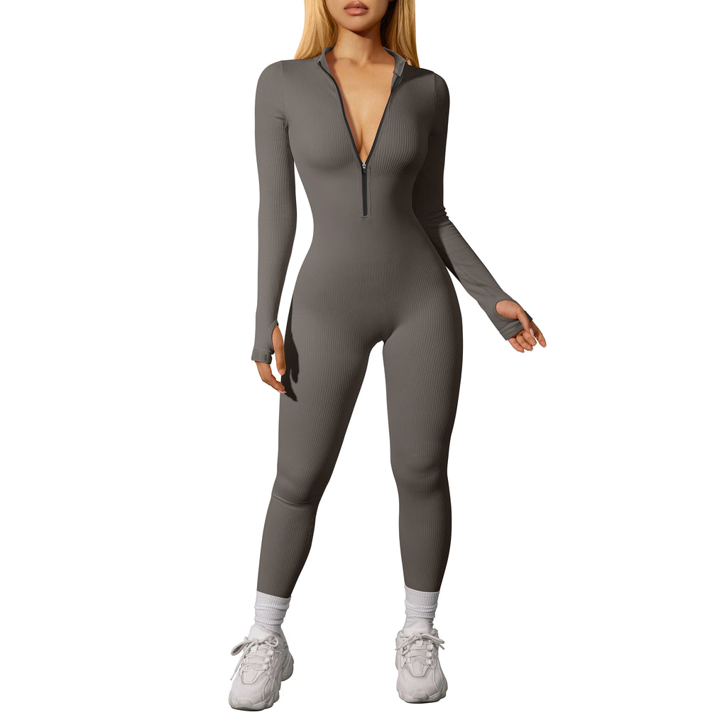 Person wearing a gray bodysuit on a white background